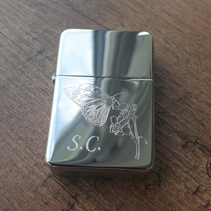 Silver lighter with butterfly and floral design