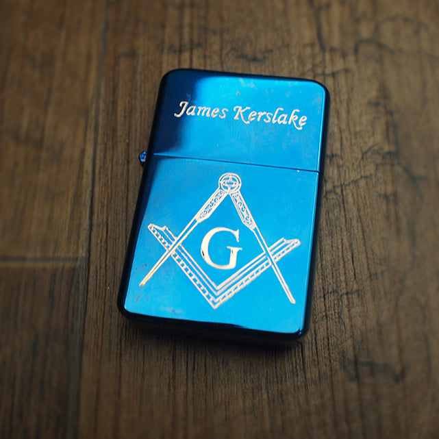 Masonic regalia artwork engraved on a personalised blue petrol lighter