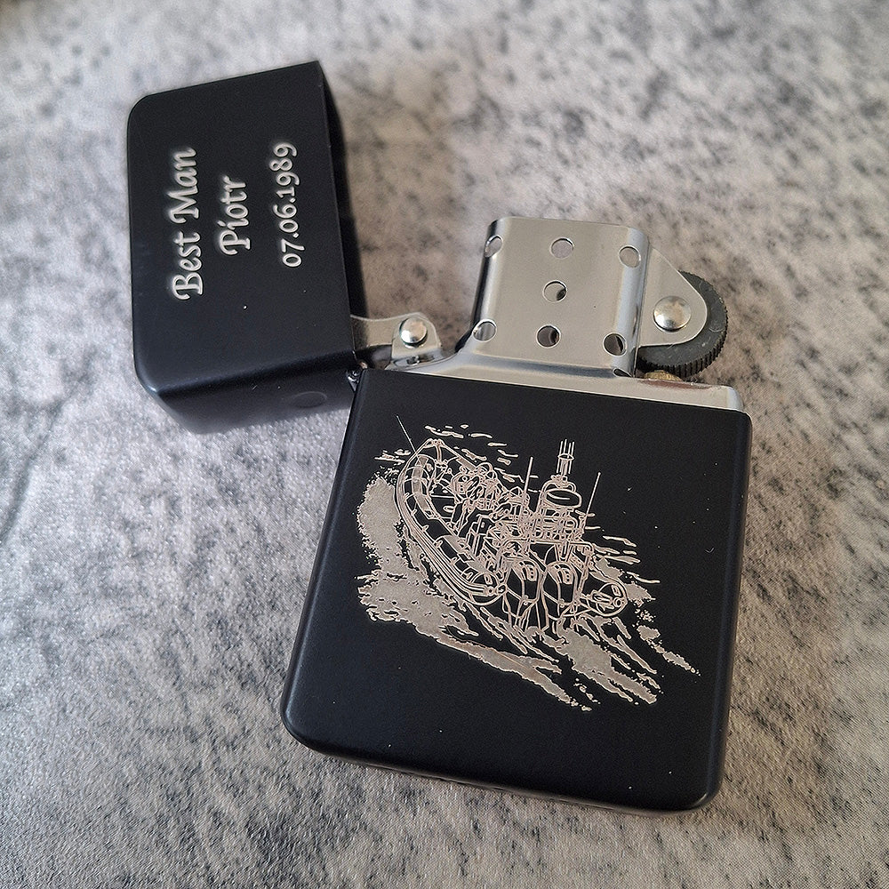 Our Inshore lifeboat artwork engraved on Matt Black lighter with personalised message on an open lid.