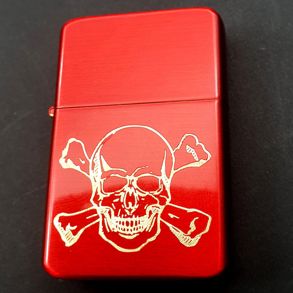 Skull and Crossbones design engraved on Red Lighter