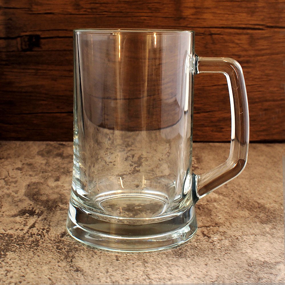 front image of plain everyday glass tankard  against a wood backdrop