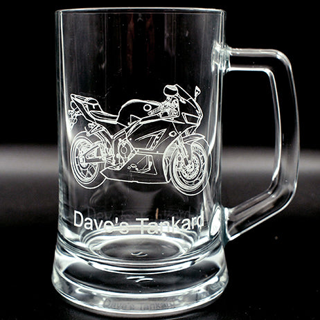 Clear glass mug with Fireblade  motorcycle engraving and 'Dave's Tankard' text on a black background