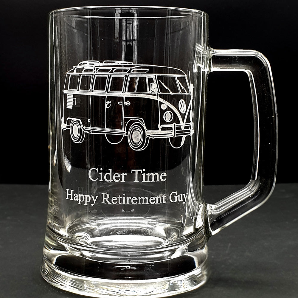 tankard glass mug with engraved campervan design and text on a black background