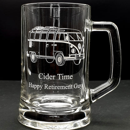 tankard glass mug with engraved campervan design and text on a black background
