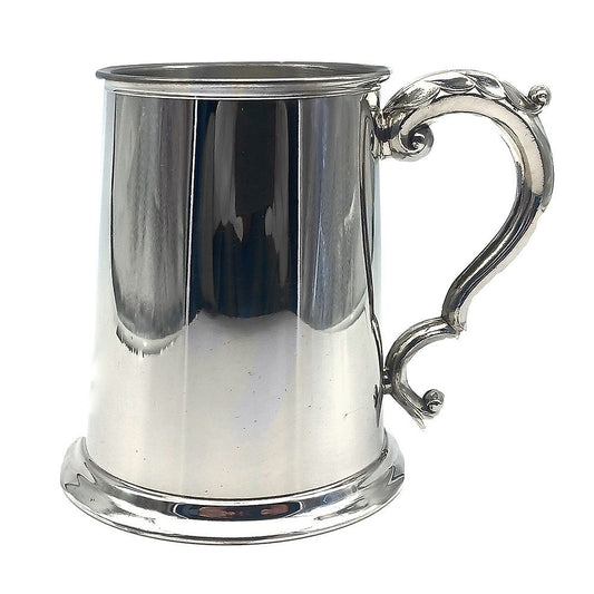 Silver pewter tankard with ornate handle