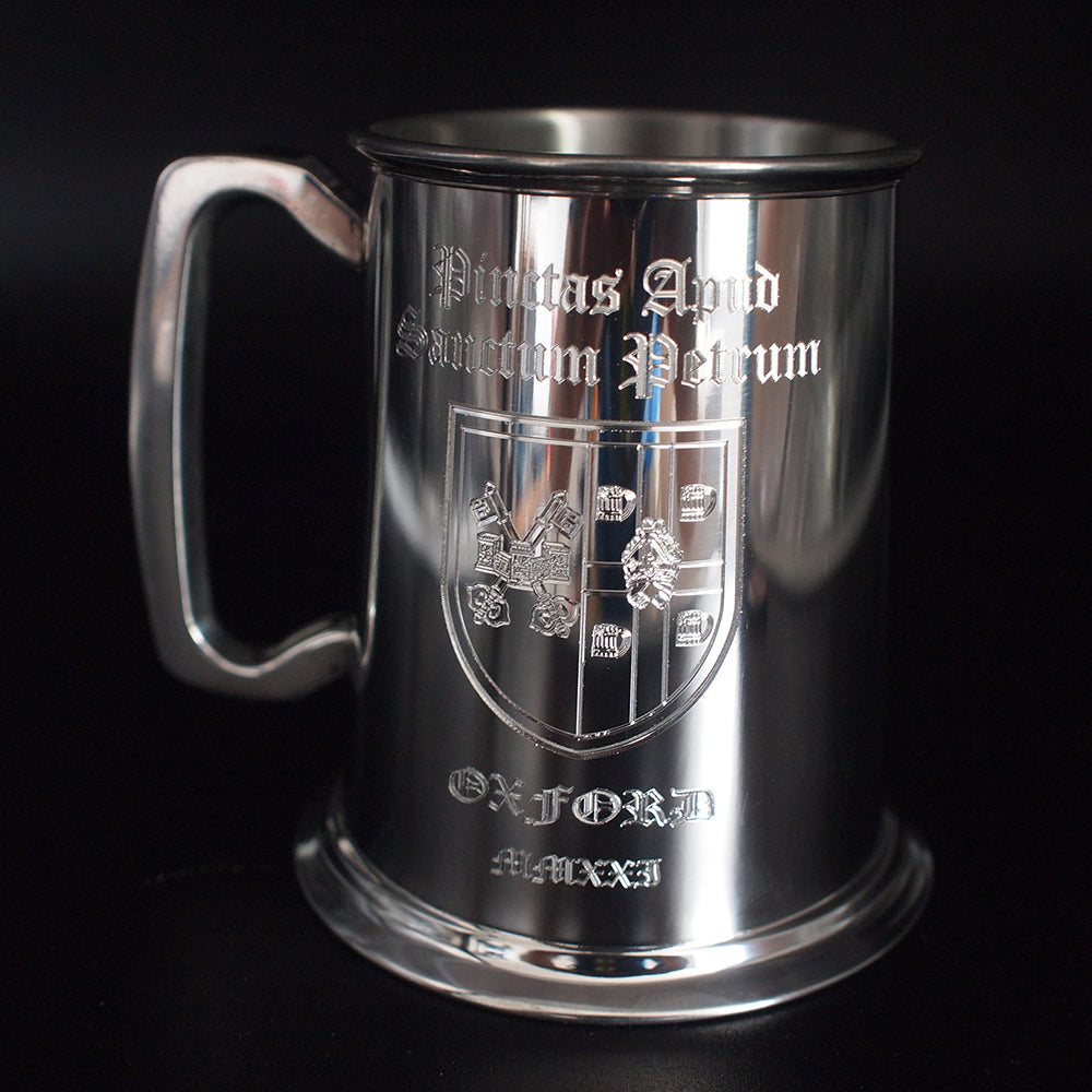 Pewter Tankard with Latin text and Crest engraved in old english font.