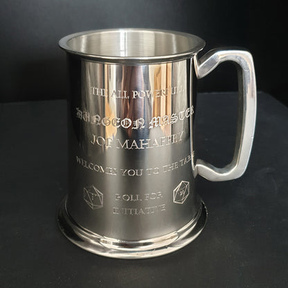 Pewter Tankard with table top gaming engraving against a dark backdrop