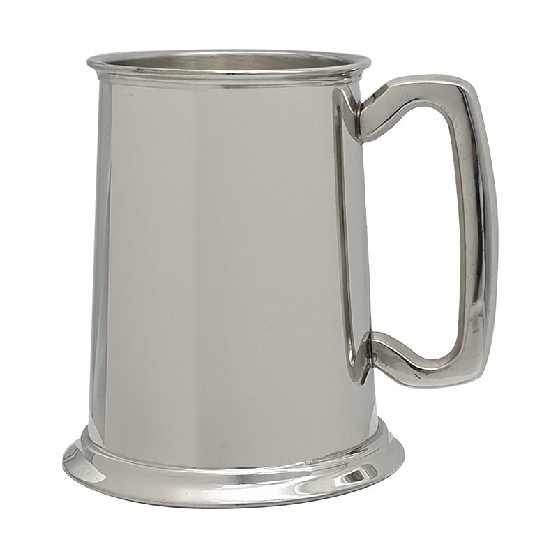 plain silver pewter tankard mug shown with handle on the right