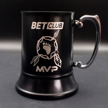 Black mug with 'BET CLUB MVP' text and design on a dark background