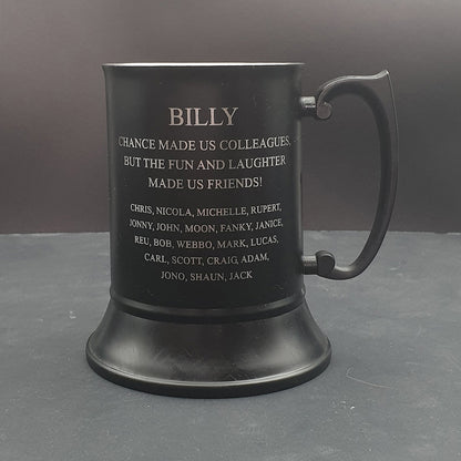 Steel Black tankard mug with engraved text on a Gray background