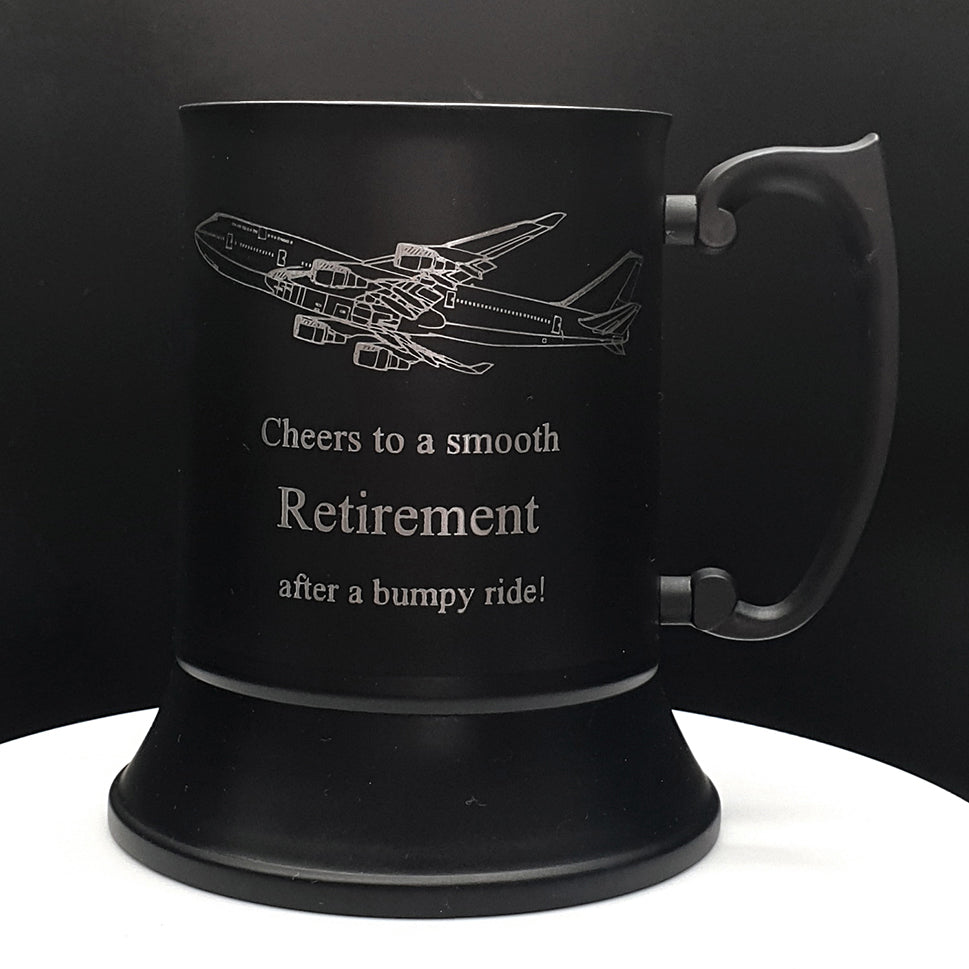 Black metal mug with Boeing 747 airplane design and humorous retirement message on a black background