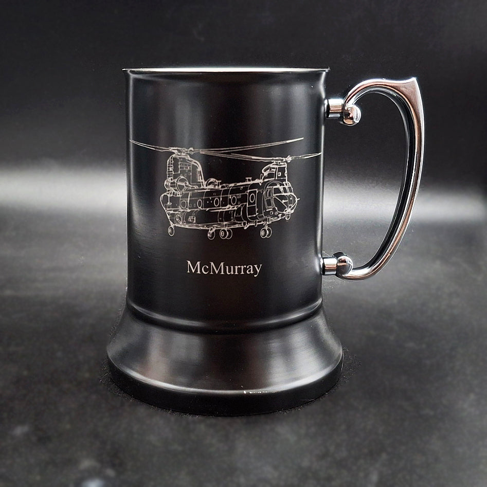 Black Steel tankard engraved with our Chinook Helicopter Artwork with the name "McMurry" engraved underneath.