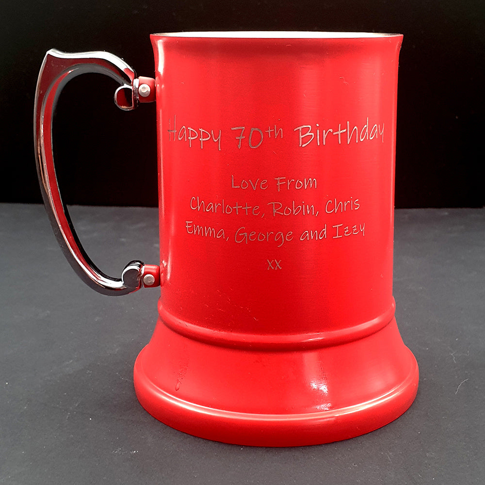 Red Steel Tankard with Birthday message engraved against a dark background