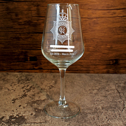 Metropolitan Police logo with retirement text on an everyday wine glass.