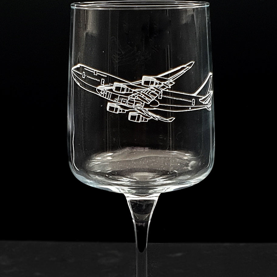 Close up of boeing 747 aircraft artwork on a  wine glass