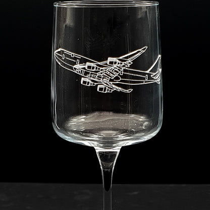 Close up of boeing 747 aircraft artwork on a  wine glass