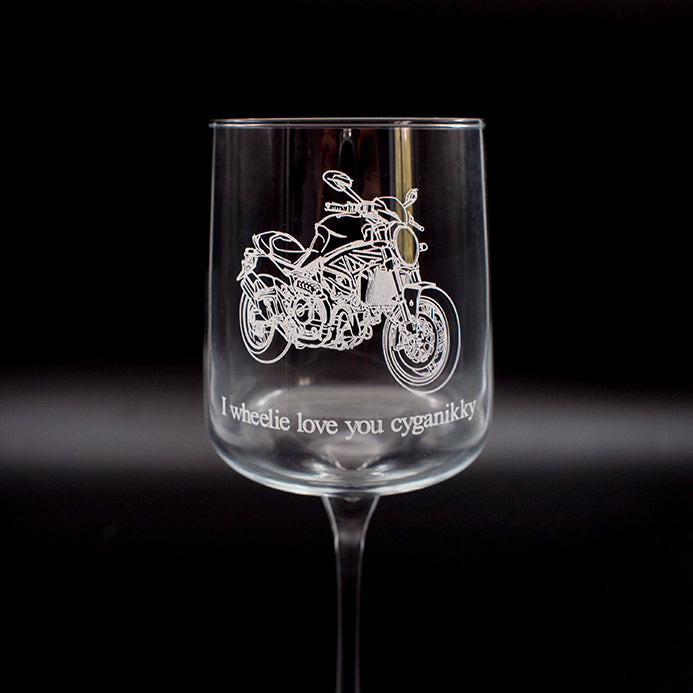 Monster motorcycle with humourous engarving below.