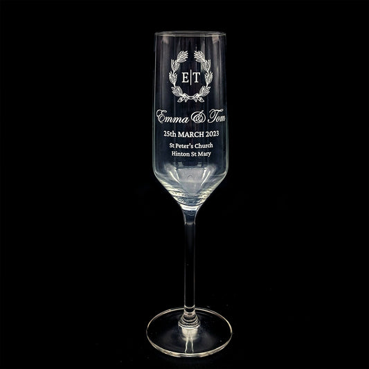 Wedding Champagne flute with engraved text on a black background